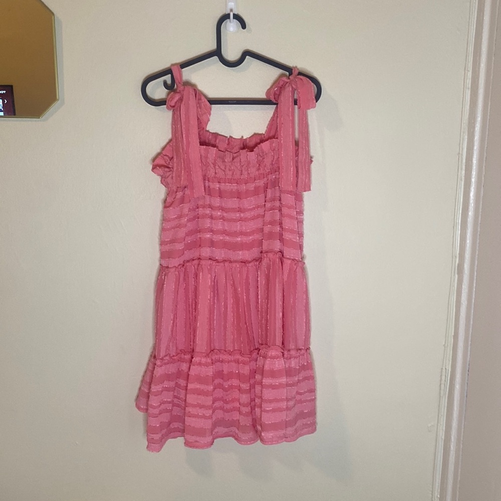 Bright pink sundress! Perfect for days where you are feeling more femme.